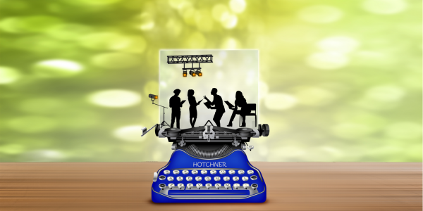 silhouette of actors on the page in a typewriter